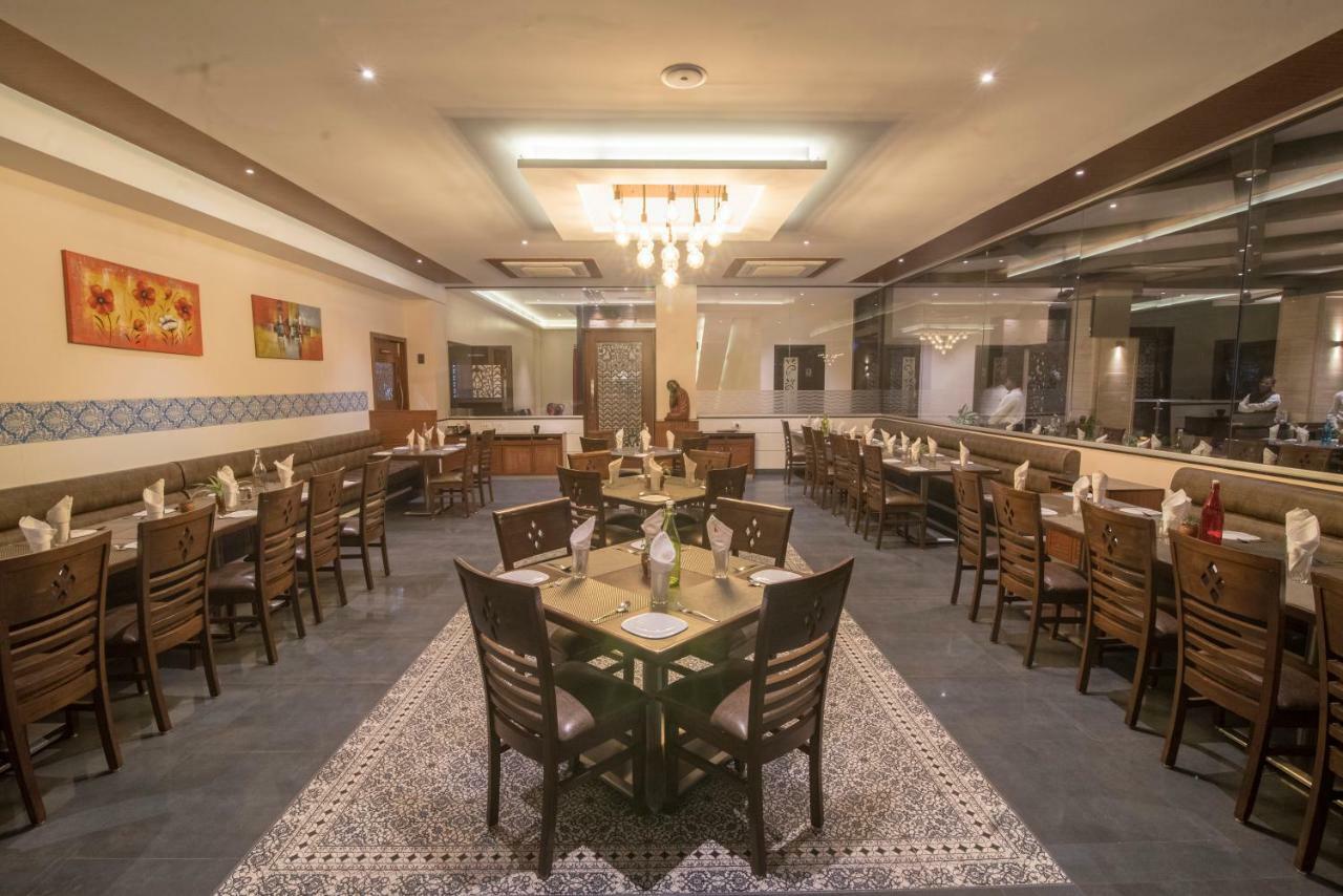 Hotel Ayodhya Kolhapur Bagian luar foto